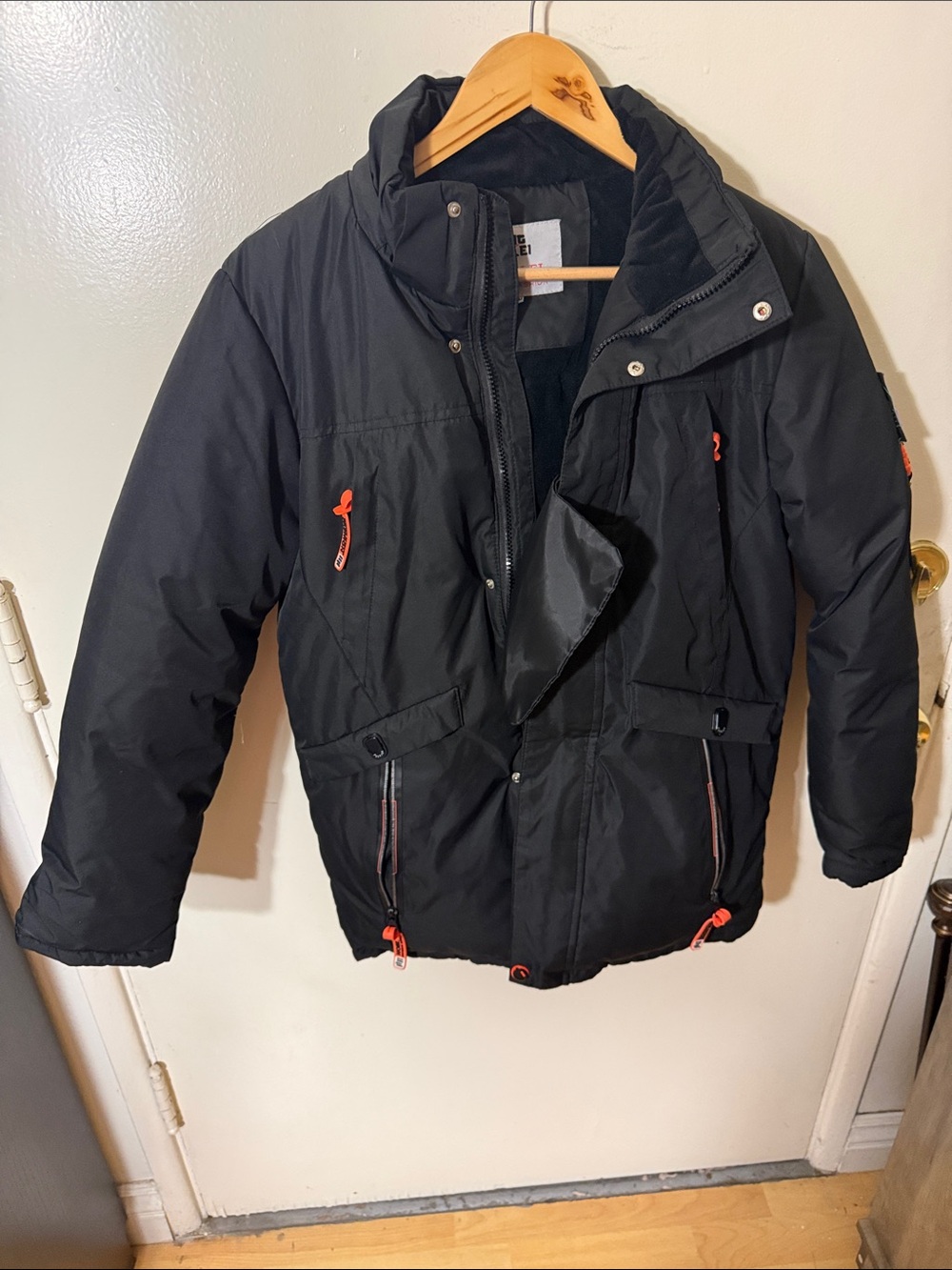 Kids Black Puffer Jacket with Orange Accents - Brand Unspecified